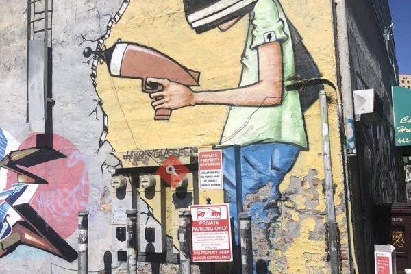 Helmeted Man with Gun mural